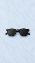 REUT Amalfi tortoise sunglasses on light blue marble